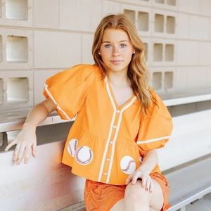 Orange Peplum Baseball top